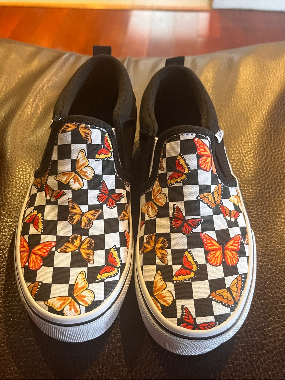 Vans Kids Checkerboard Slip-On Sneakers with Orange Butterfly Print